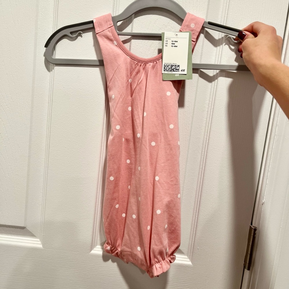 Pink polka dot onesie